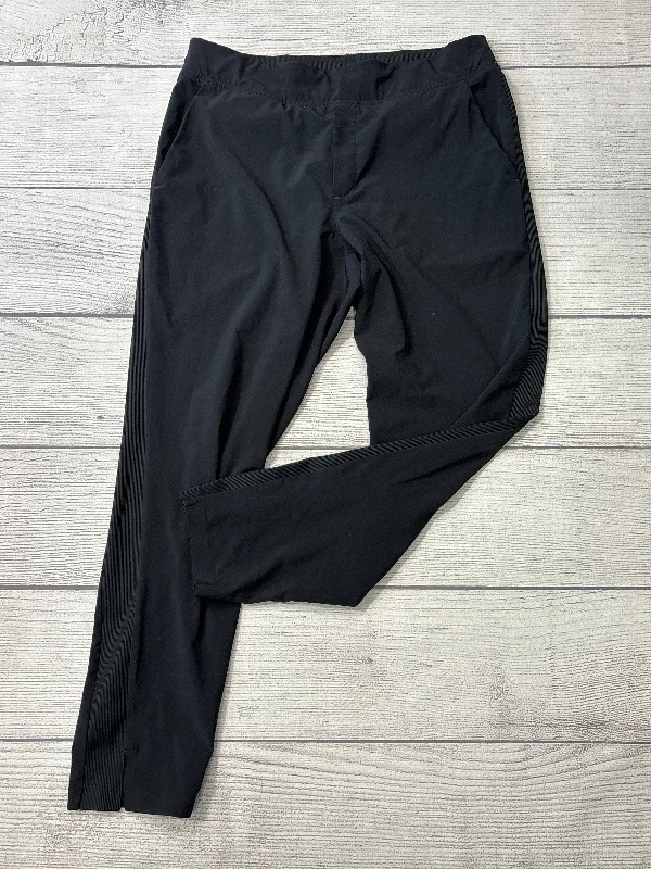 Retro bell-bottom pants for 70s-inspired fashion -Pants Other By Athleta In Black, Size: 10