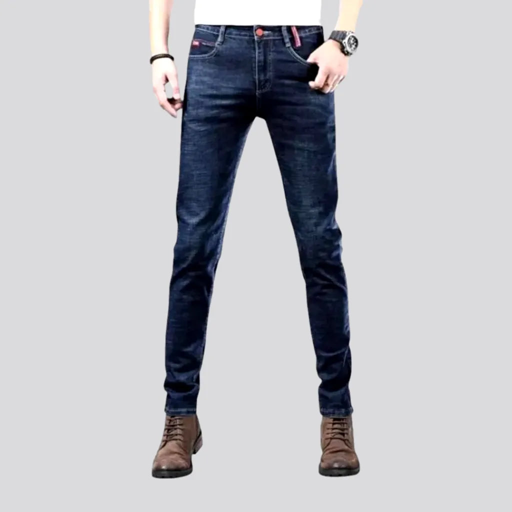 Frayed Hem Jeans for Edgy -Fitted mid rise elastic men's jeans