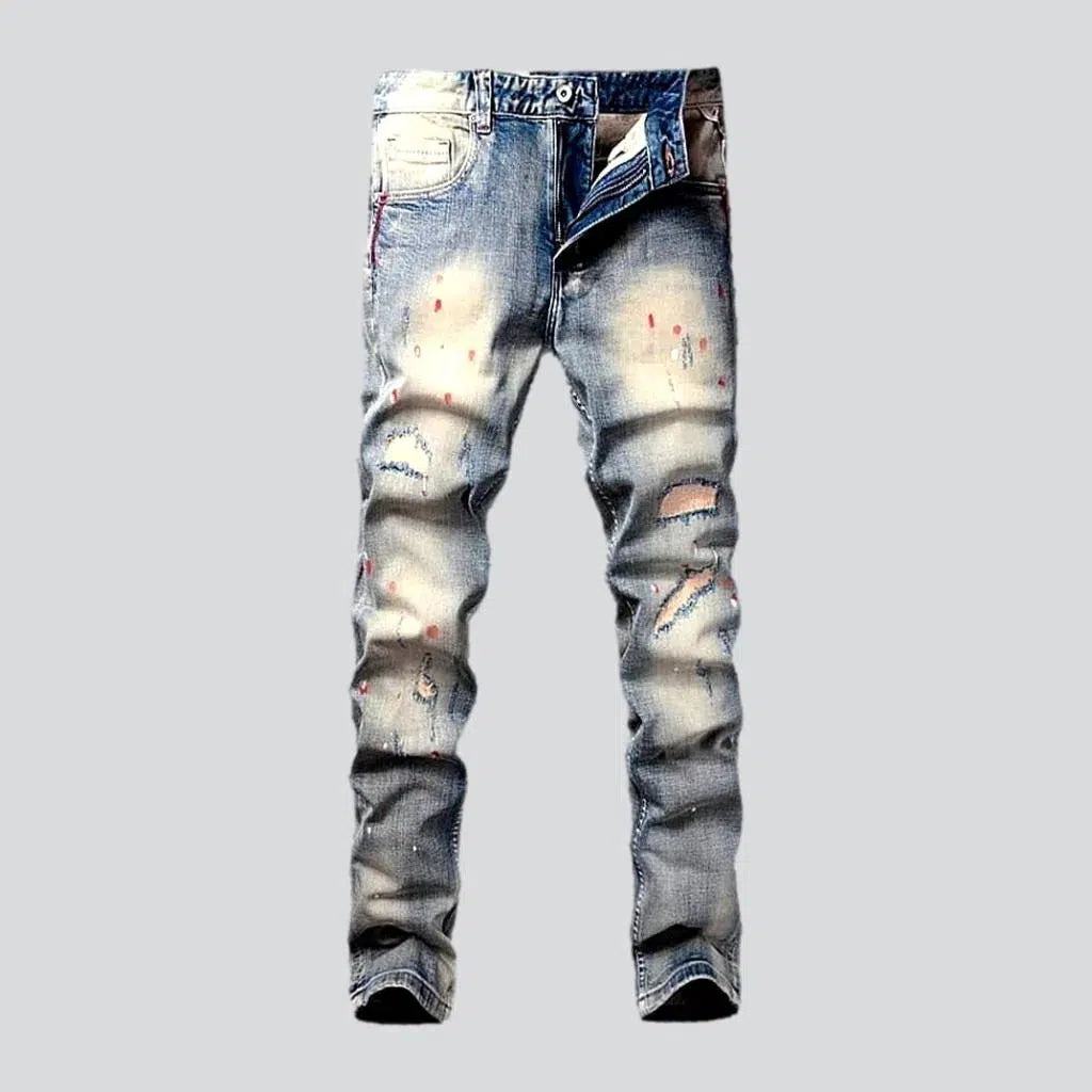 Stretch Jeans for Flexibility -Paint-splattered men's skinny jeans